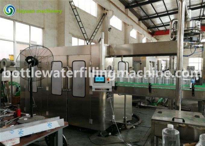 Machine de remplissage de bouteilles électrique industrielle de l'eau pour bouteille en plastique/en verre 0