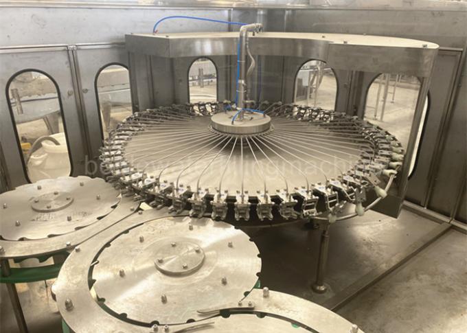 machine de remplissage de bouteilles de l'eau d'ANIMAL FAMILIER de 0.5L 24000BPH SS304 avec la transmission de vitesse 0